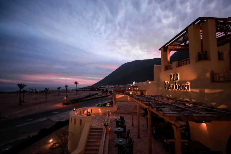 Pub Tandoori with the landscape of Taba Heights